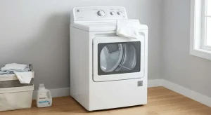 White Kenmore dryer in a clean laundry room representing dryer repair service in Lexington KY